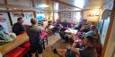 All crew, technicians and officers gather in the "living room" for the toolbox meeting.